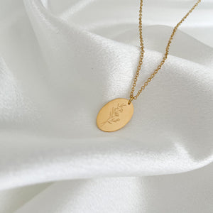 Our beautiful 'Wildflower' necklace is engraved with a hand drawn wildflower by our artist in Peru. This one of a kind pendant symbolizes one that comes from nothing and grows into something unique + beautiful.  Necklace Available in 14K Gold Vermeil or Silver  and adjustable chain.